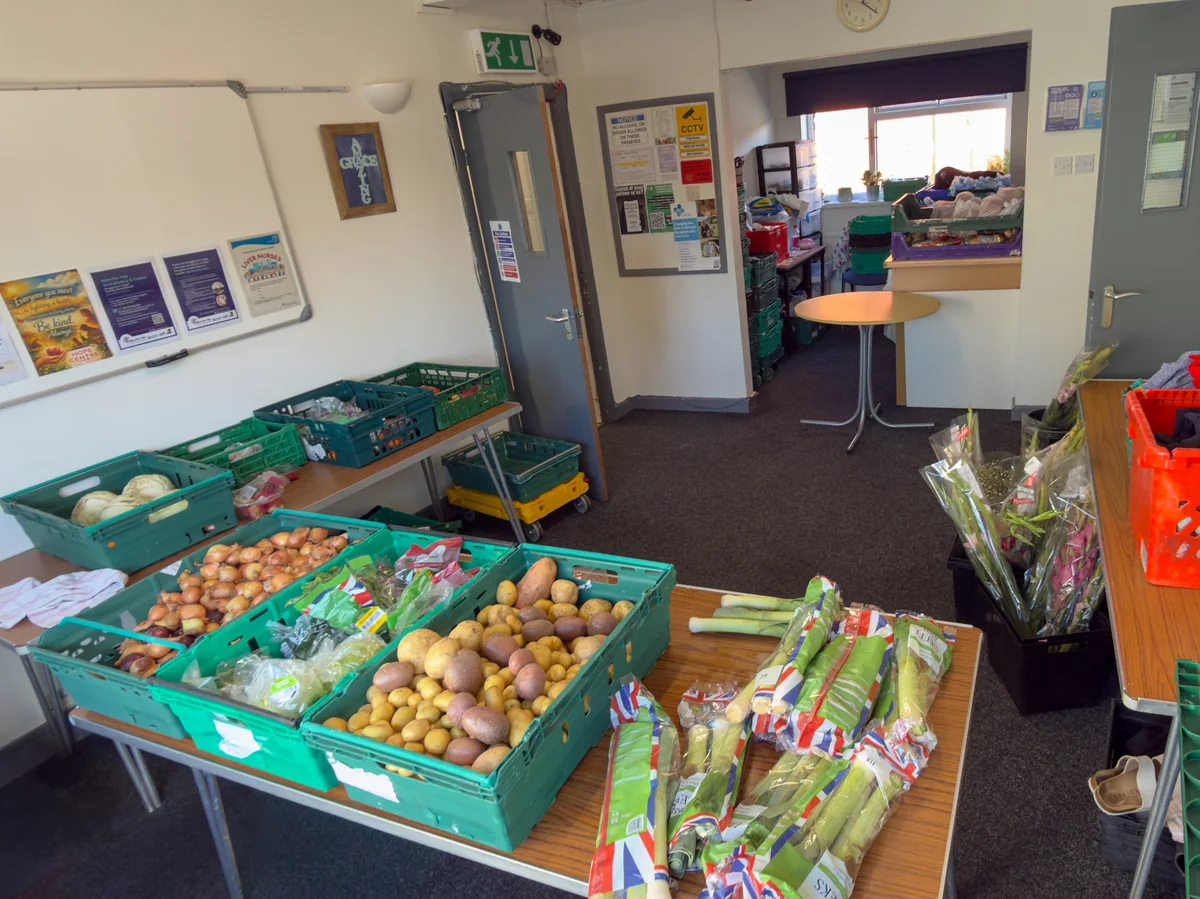 Fresh produce, fruit and pantry items laid out for guests at Trinity Mission Hope Centre