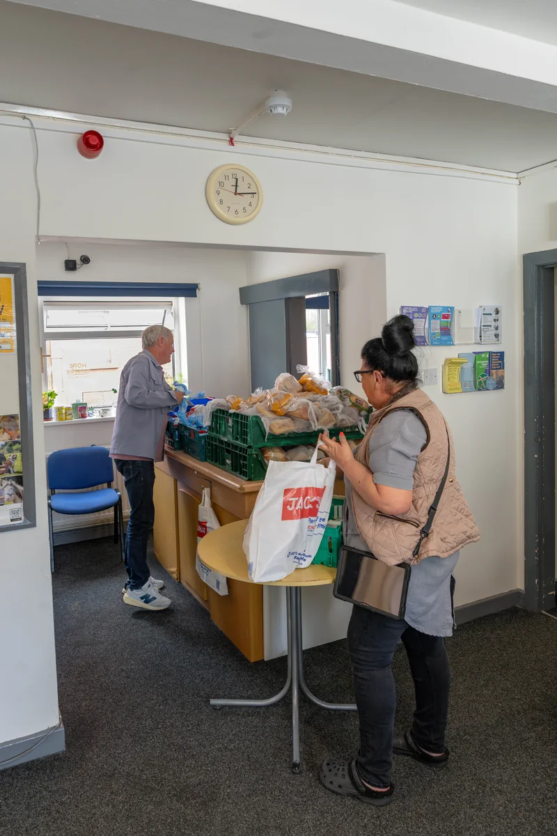 Volunteers distributing fresh bread and hot food parcels at the Hope Centre